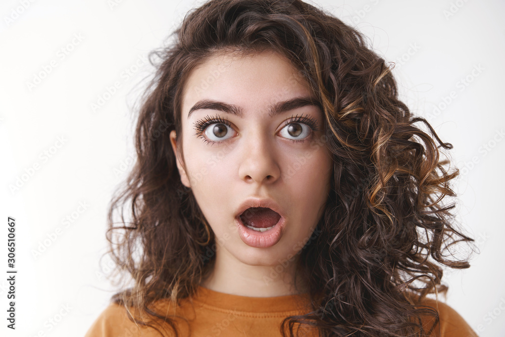 Headshot shocked speechless impressed attractive curly-haired caucasian woman drop jaw open mouth stunned gasping surprised cannot believe own eyes, standing white background astonished Headshot shocked speechless impressed attractive curly-haired caucasian woman drop jaw open mouth stunned gasping surprised cannot believe own eyes, standing white background astonished