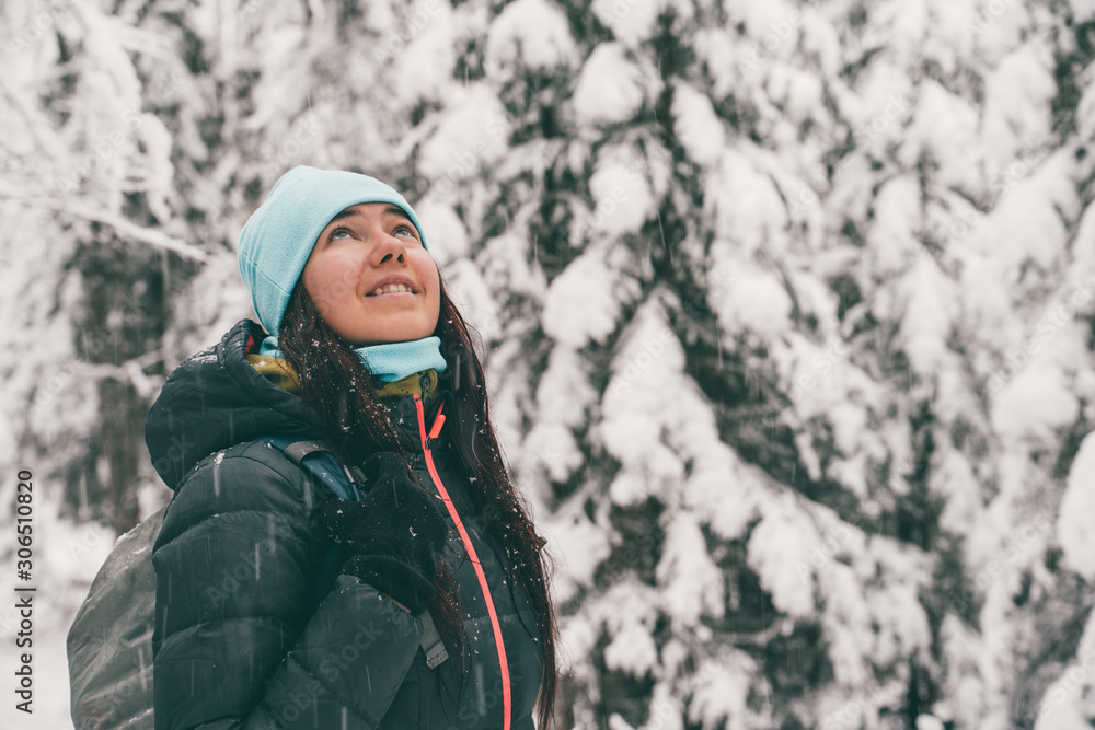 Image of tourist woman walking in winter forest. Image of tourist woman walking in winter forest.