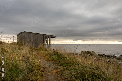 Birdwatching cabin by the sea, at Lista in Norway photo