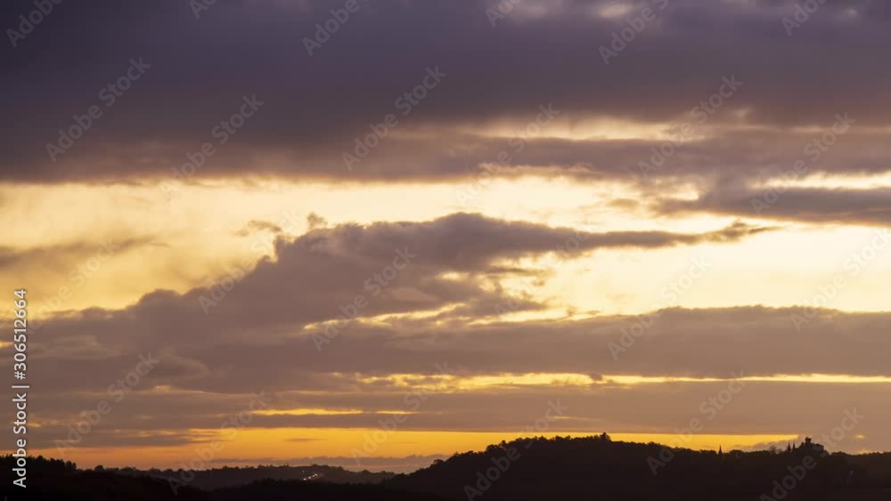 timelapse of a cloudy sky at sunrise