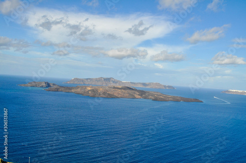 The island with the volcano on Santorini
