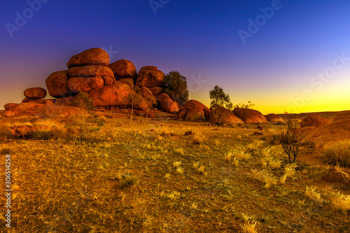 Devils Marbles rock formations at twilight. Australian outback landscape Karlu Karlu - Devils Marbles Conservation Reserve at dusk in Northern Territory, Australia. photo