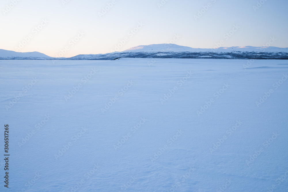 Fototapeta premium winter landscape in sweden in the evening