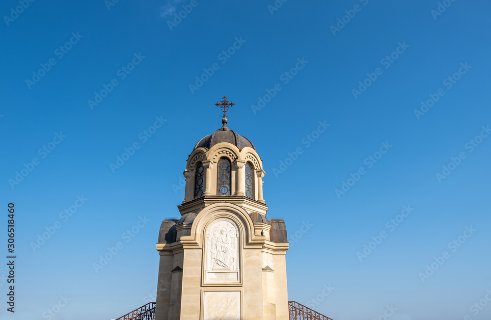 Chapel of the New Martyrs and Confessors of Russia in Yalta against a blue sky.