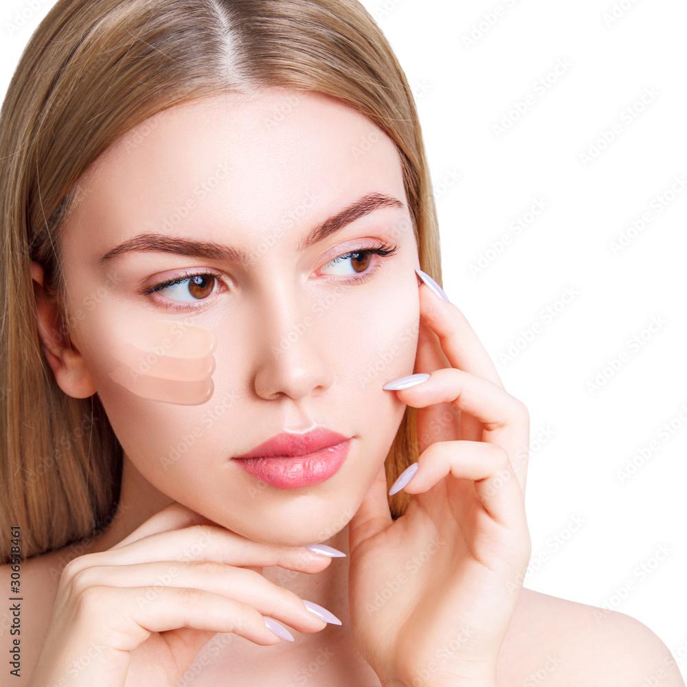 Beautiful young woman with smears of foundation on face. Beautiful young woman with smears of foundation on face.