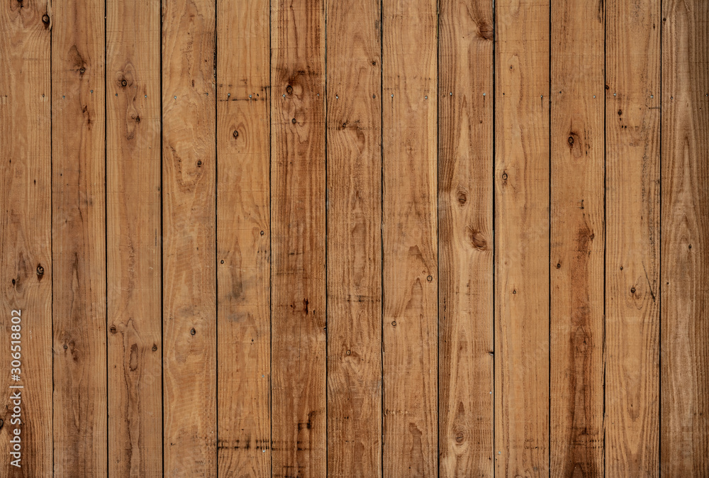 Dark old vertical wood panels with nice patterns and knotholes Dark old vertical wood panels with nice patterns and knotholes