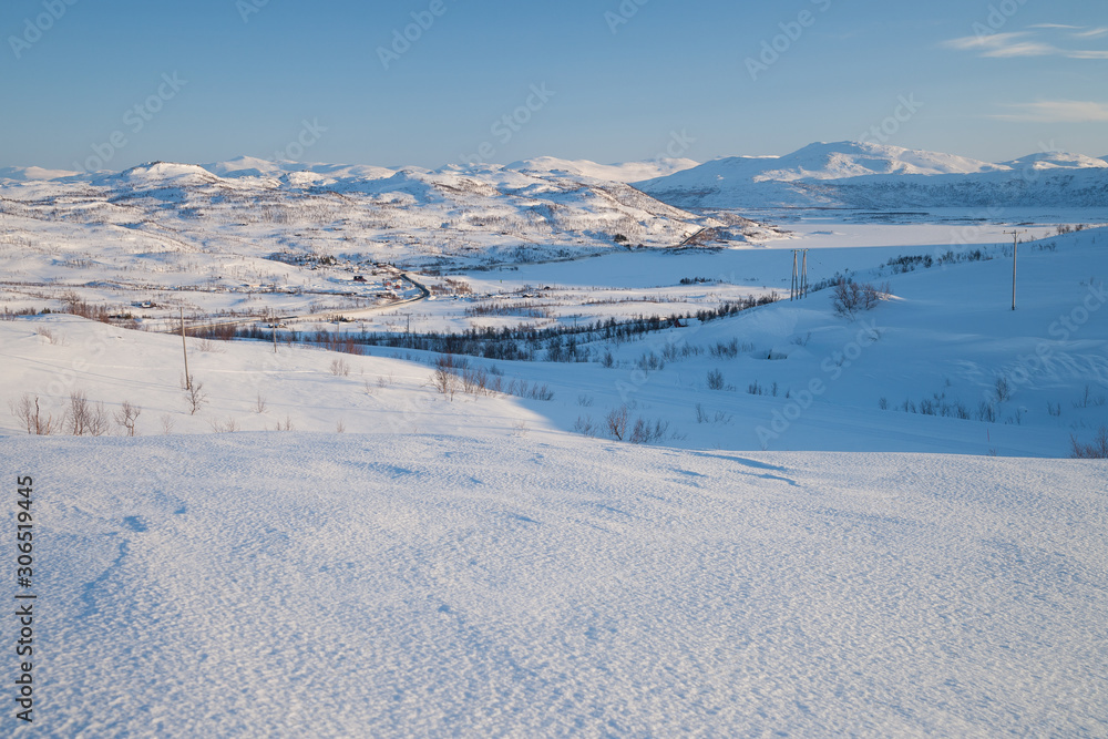 evening light over a beautiful winter landscape in norway