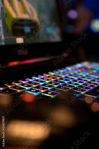 RGB lit gaming keyboard in an esports or convention setting