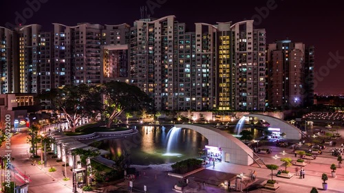 Offices & apartments in Brigade Gateway in front of the World Trade Center and Orion mall time lapse at night