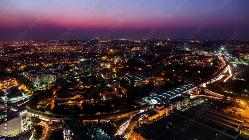High angle view on Sandal Soap Factory metro station and Yeswanthpur industrial park day to night time lapse High angle view on Sandal Soap Factory metro station and Yeswanthpur industrial park day to night time lapse