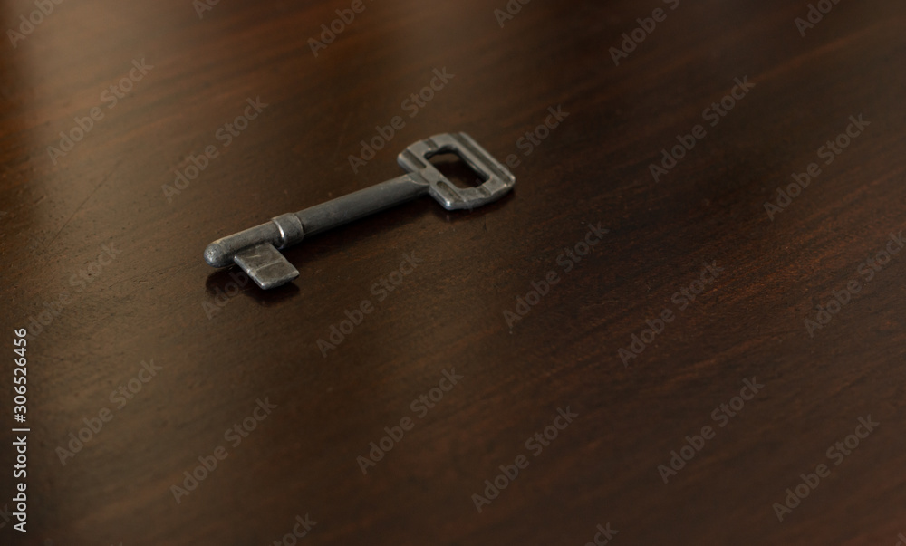 soft focus old iron key lay on wooden perspective surface brown background soft focus old iron key lay on wooden perspective surface brown background