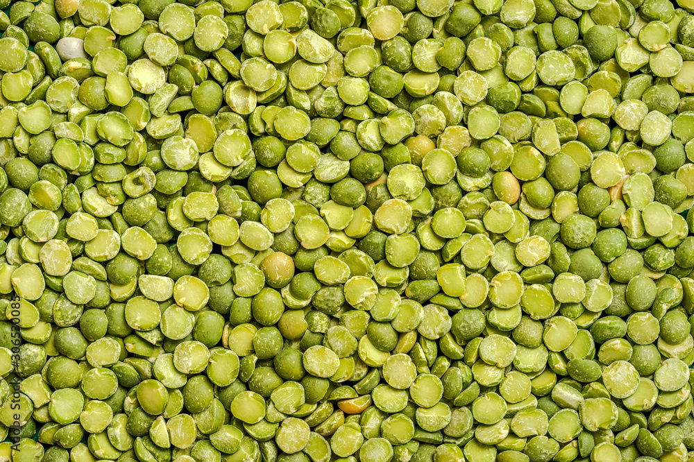 Green split peas. Full-screen background image Green split peas. Full-screen background image