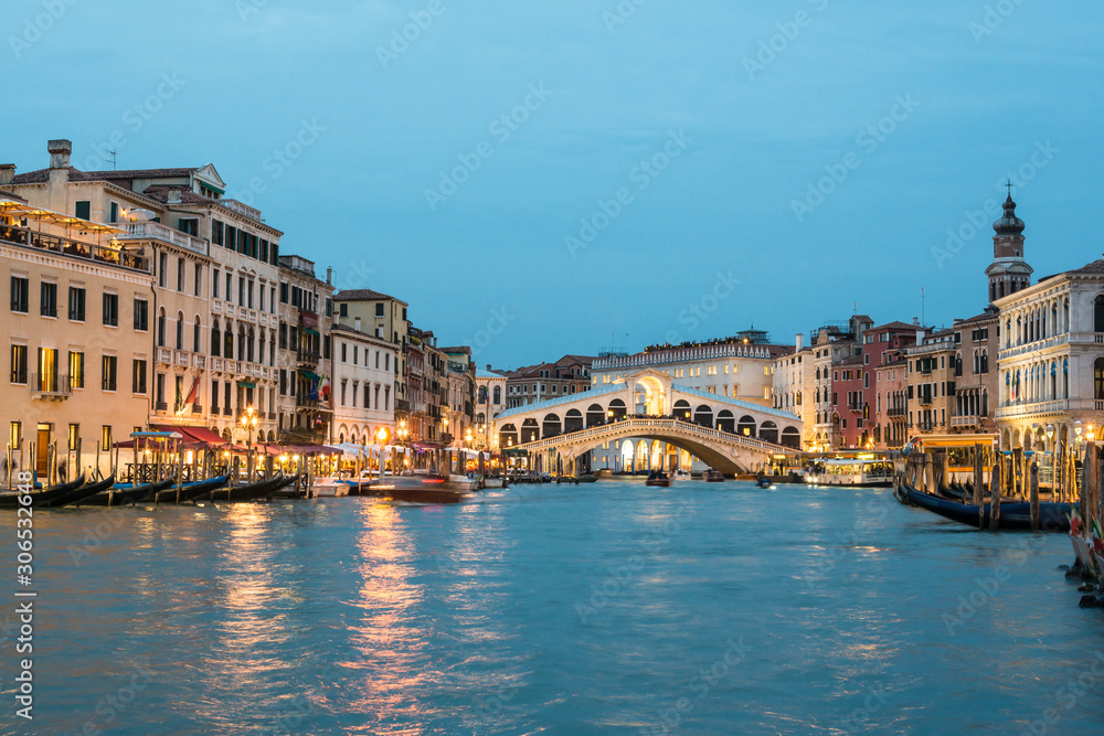 Grand Canal and Rialto Bridge at the dusk time. Venice, Italy.