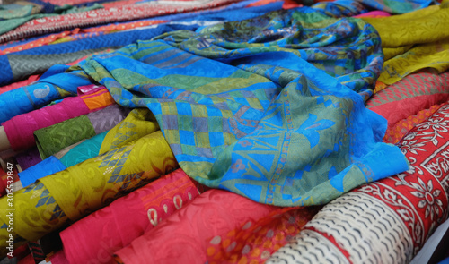 Photography artistic variety shade tone colors ornaments patterns of indian silk textiles in