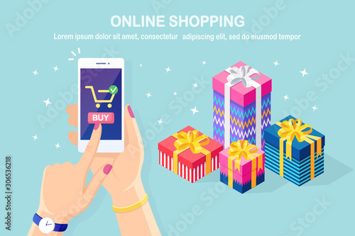 Online shopping concept. Buy in retail shop by internet. Discount christmas sale. 3d isometric gift box, bag, pile of package. Mobile phone, smartphone with cart icon in hand. Vector design for banner