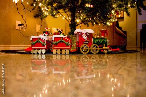 Papai Noel em trem de brinquedo natal photo
