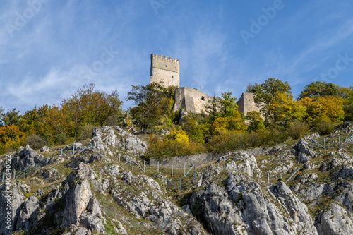 The ruin of Randeck castle in Markt Essing  Bavaria  Germany in autumn with multi colored trees