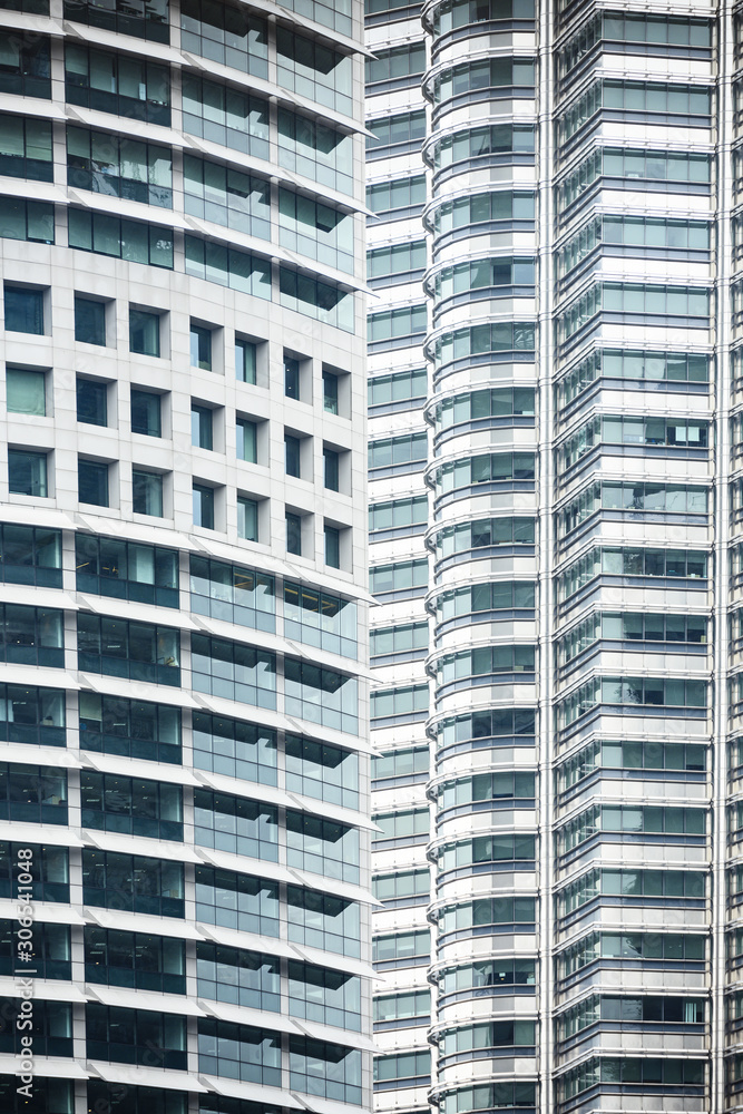 Close-up view of some modern and futuristic skyscrapers in Kuala Lumpur, Malaysia. Kuala Lumpur commonly known as KL, is the national capital of Malaysia.