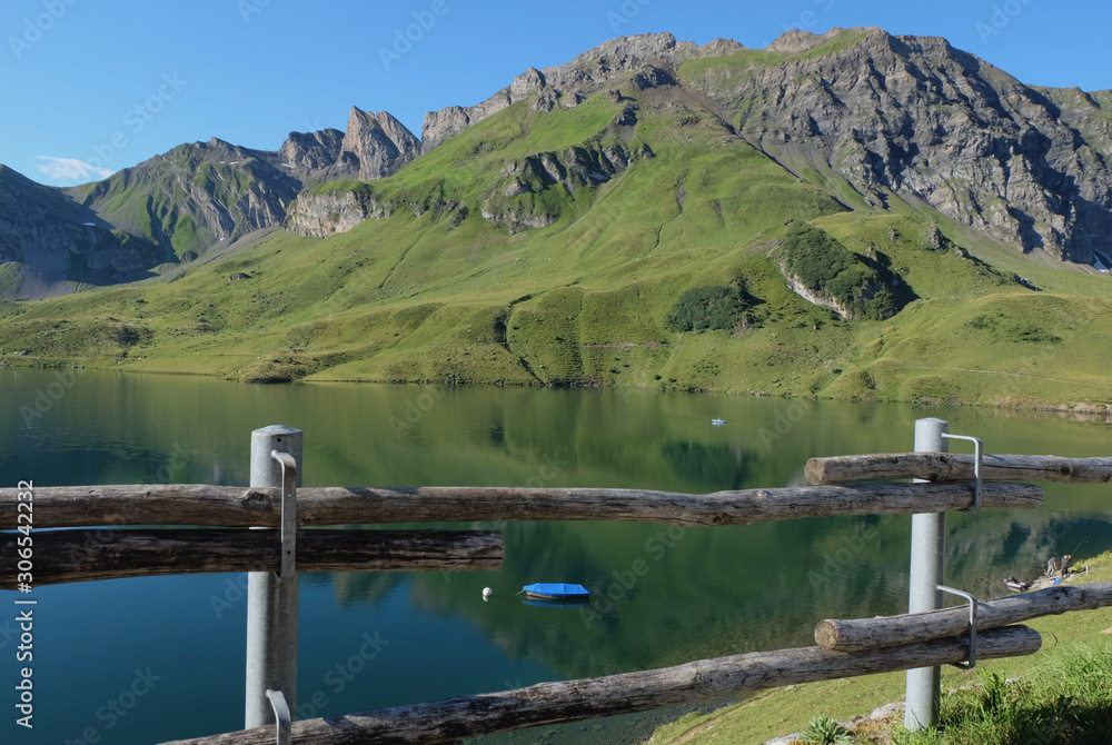 mountain lake in the Swiss Alps, Melchsee-Frutt, canton Obwalden, Switzerland mountain lake in the Swiss Alps, Melchsee-Frutt, canton Obwalden, Switzerland