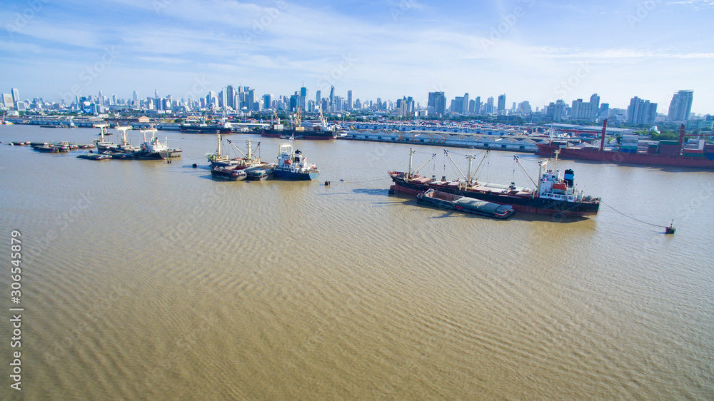 aerial view of klong tuey port and container ship floating in chao praya river bangkok thailand