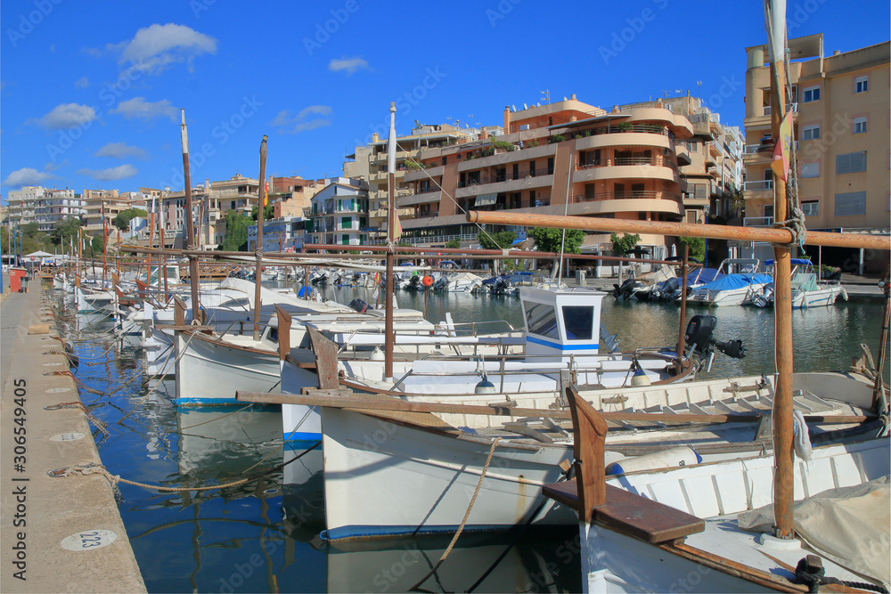 Traditional boats moored in marina of the island of Palma de Mallorca.