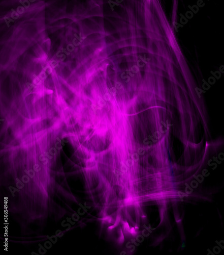Long exposure, light painting photography, purple and pink swirl against a black background. Ghost shape.