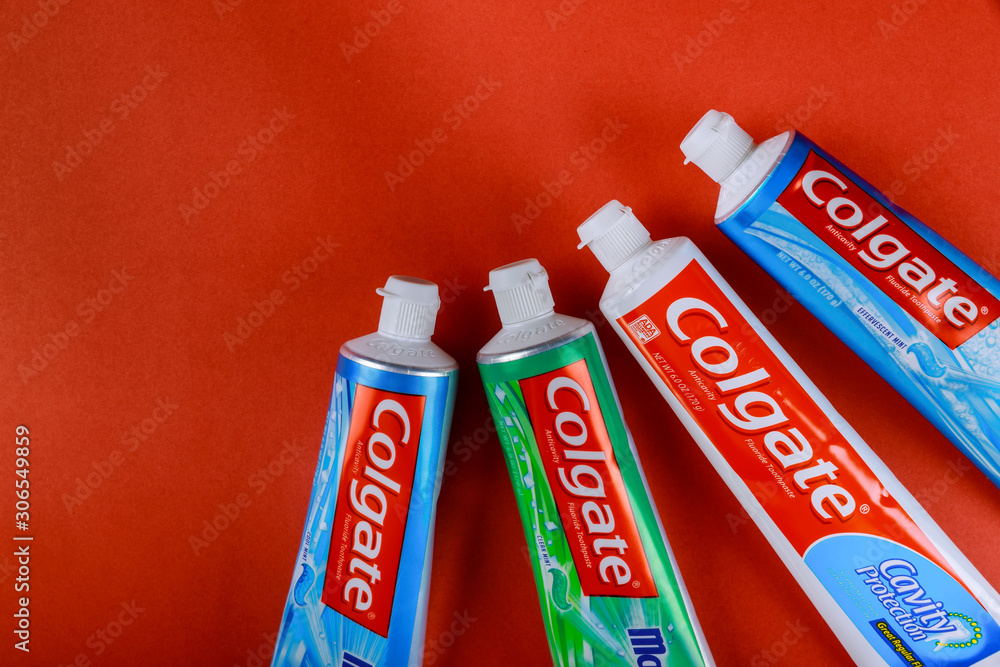 Isolated with red background of Colgate toothpaste is produced and