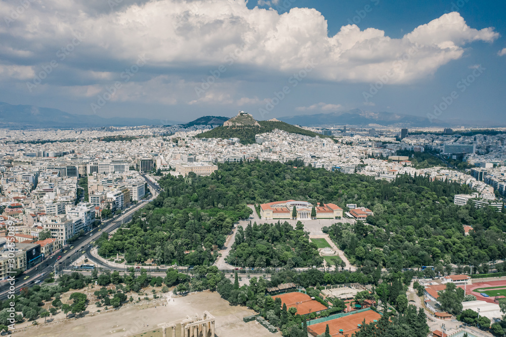 Aerial drone shot of Lycabettus hill and Zappeion in National Garden and Olimpio in Athens