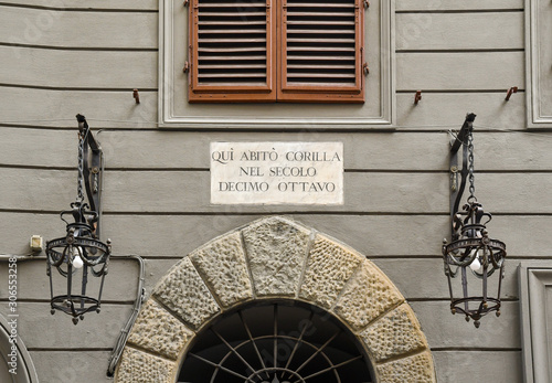 Detail of the façade of an old palace with the inscription 