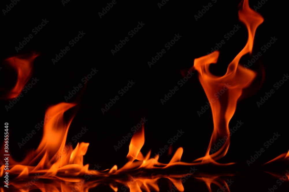 Beautiful fire flames on a black background. Beautiful fire flames on a black background.