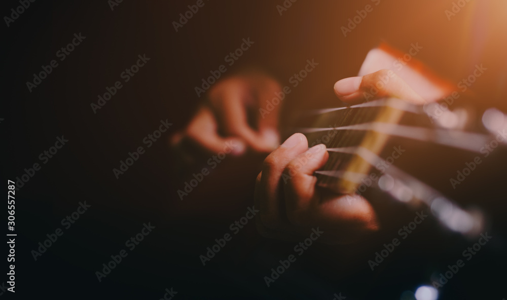 ukulele guitar,Vintage dark tone holiday relax break time with music or art concept with copy space - obrazy, fototapety, plakaty 