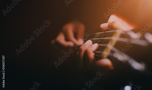 Foto ukulele guitar,Vintage dark tone holiday relax break time with music or art conc