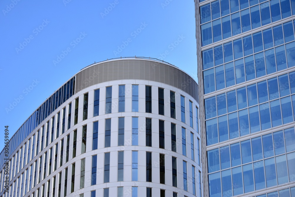 Abstract texture of blue glass modern building skyscrapers. Business background. Abstract texture of blue glass modern building skyscrapers. Business background.