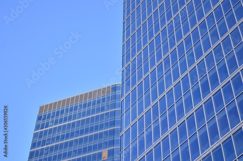 Abstract texture of blue glass modern building skyscrapers. Business background.