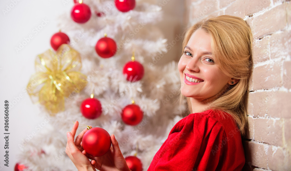 Woman happy smiling near christmas tree. Christmas eve concept. Girl in red dress near christmas tree with ornaments. Waiting for christmas. Things you must do before holiday celebration start Woman happy smiling near christmas tree. Christmas eve concept. Girl in red dress near christmas tree with ornaments. Waiting for christmas. Things you must do before holiday celebration start
