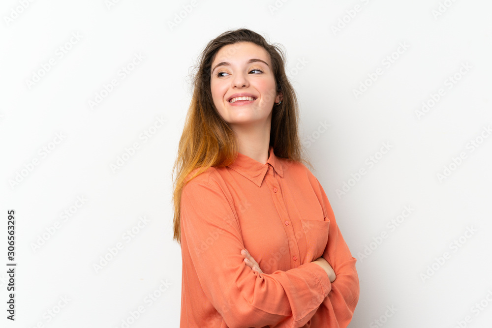 Young brunette girl over isolated white background with arms crossed and happy Young brunette girl over isolated white background with arms crossed and happy