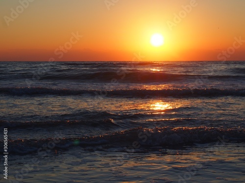Beautiful Sarasota Sunset with Light Reflected in Gulf Waves