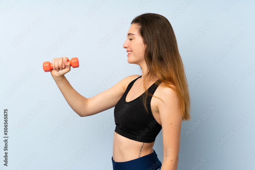Young sport woman with weightlifting over isolated blue background with happy expression Young sport woman with weightlifting over isolated blue background with happy expression