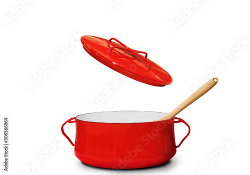 Big red pot for soup with fork and spoon	