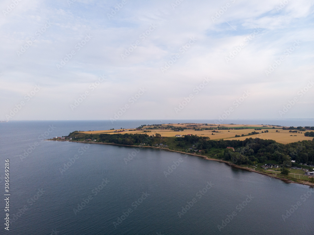 Aerial view of the southern part of the island Ven in southern Sweden during an early morning sunrise in summer. 