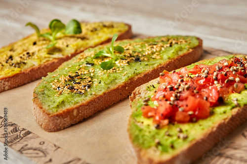 Vegan toasts with vegetables
