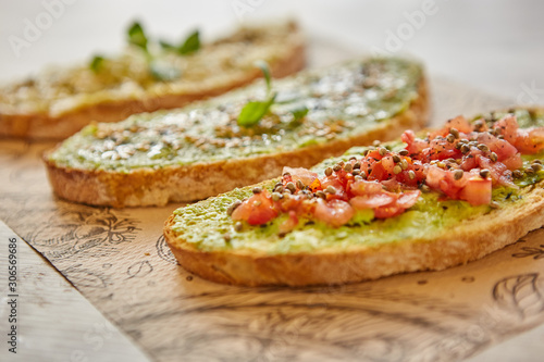 Vegan toasts with vegetables