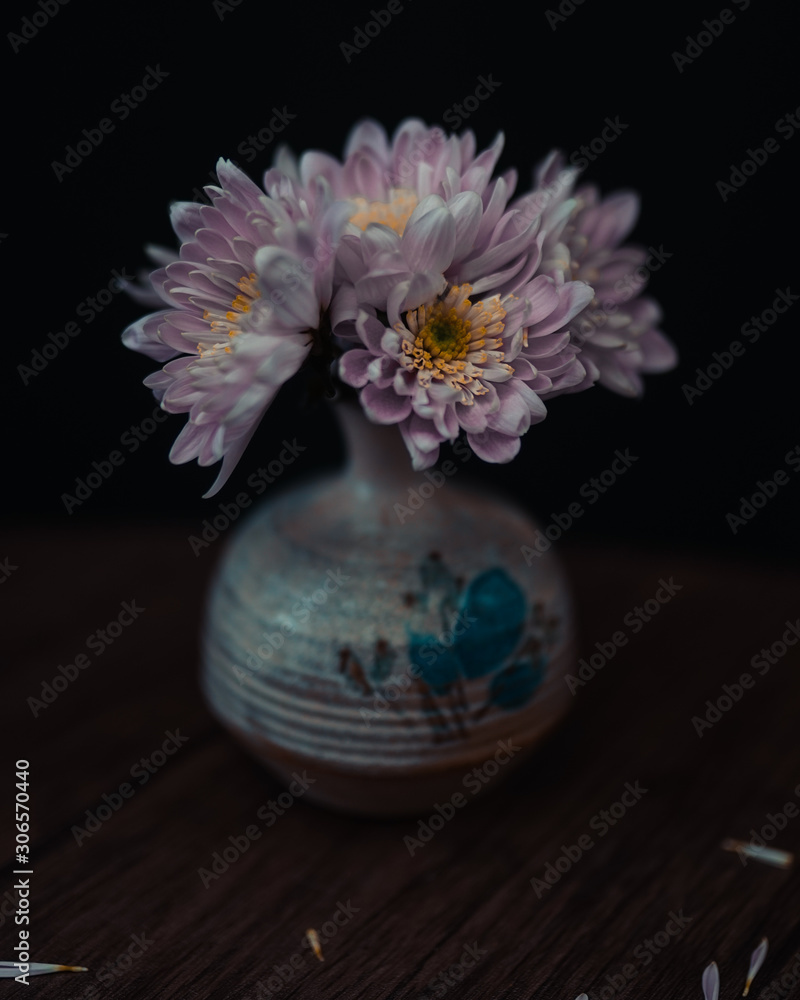bouquet of flowers in vase on black background bouquet of flowers in vase on black background