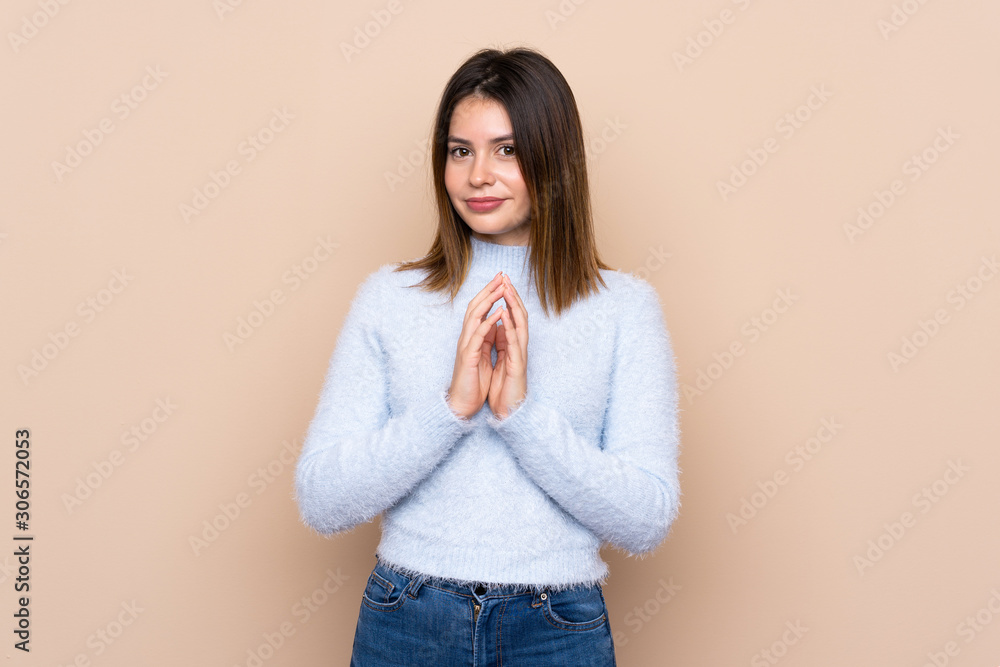 Young woman over isolated background scheming something Young woman over isolated background scheming something