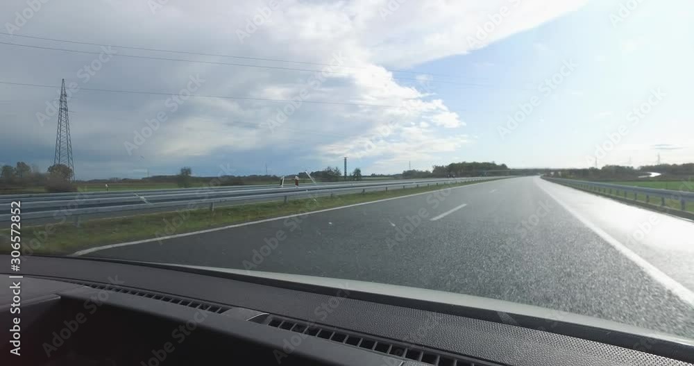 Highway driving after rain when the sun came up, with low traffic from the opposite direction, no traffic jams. Highway driving after rain when the sun came up, with low traffic from the opposite direction, no traffic jams.