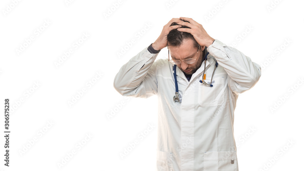 Male doctor hloding hands on his head. Headache and pressure Male doctor hloding hands on his head. Headache and pressure