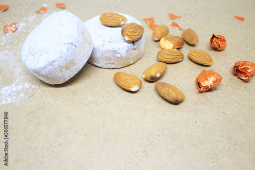 Background. Almond mantecado, polvoron on a background of brown paper photo