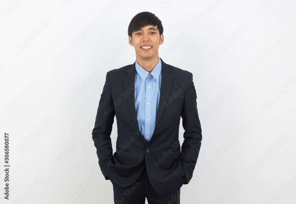 Young handsome asian business man looking to camera isolated on white background. Young handsome asian business man looking to camera isolated on white background.