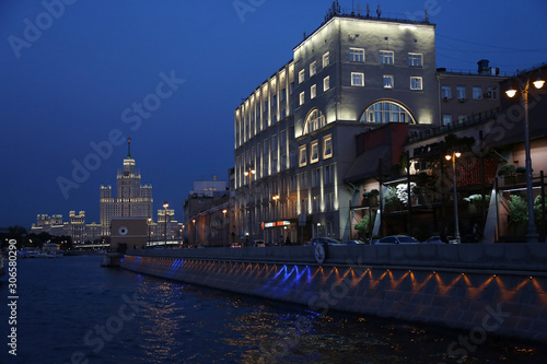 Moscow. Walk on the Moscow River on the boat. Night view of Raushskaya embankment and a high-rise building on Kotelnicheskaya embankment. photo