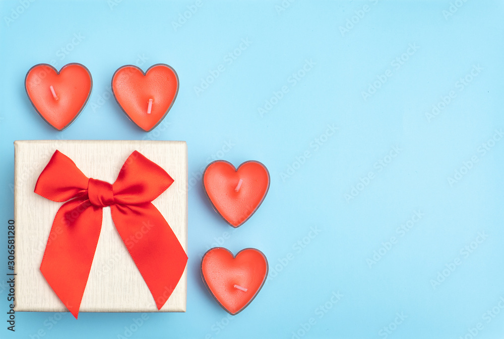 yellow box with red   heart  on blue backgound. Wedding card ideas and Valentines Day copy space for text. Flat lay